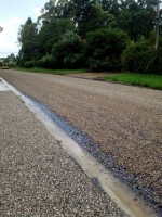 Colocación de capa piedra en calle E. Castellanos